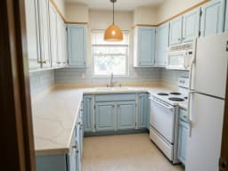 Sample kitchen remodeled in Coastal style