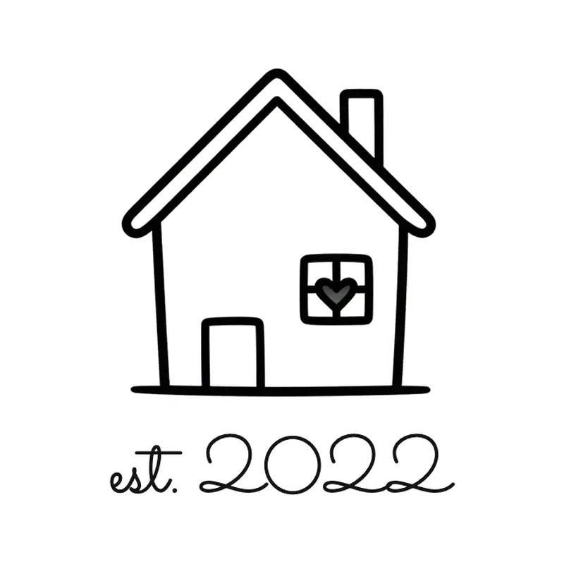 Fine line tattoo design of a tiny house with a heart in the window and the words est. 2022